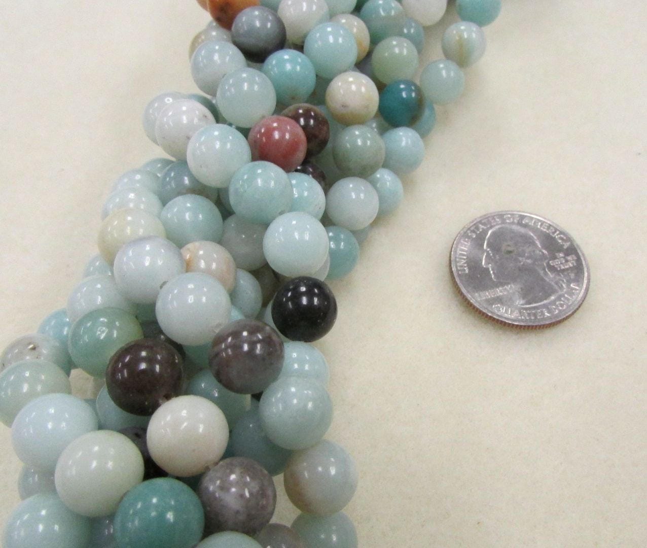 Black Gold Amazonite strand, 8mm smooth polished 16-inch strand